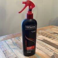 TRESemmé® Used By Professionals is a heat tamer (or heat protectant) that protects your hair up to 450°F.