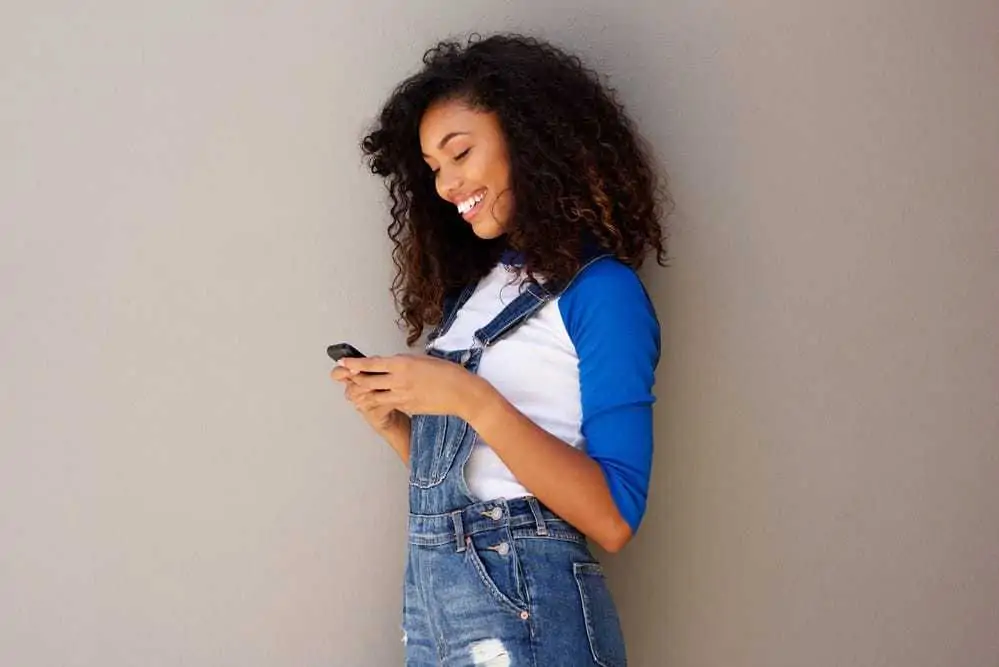 An African American female learning that what you eat is important for edges, not just your hair care routine.