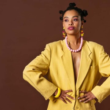 African American female wearing bantu knots