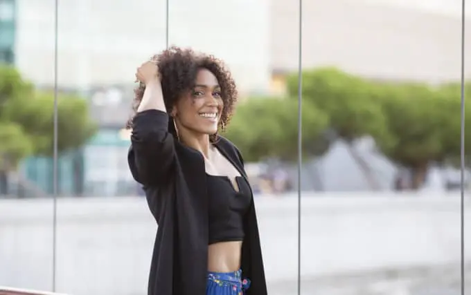 African American female with type 4A naturally curly hair.