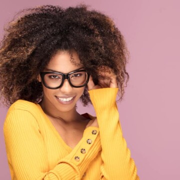 Black girl with ombre wavy, straight weave on a blended hair type