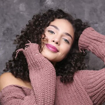 women girl with curly brown hair