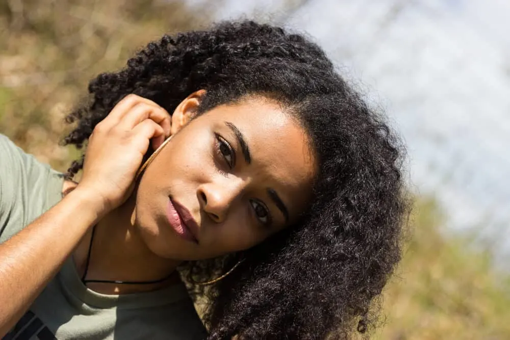 Black girl with beautiful healthy hair with a type 4 curl pattern