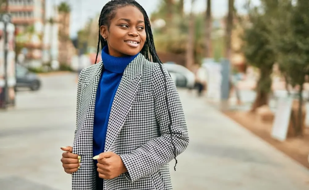 African American wearing a houndstooth jacket with black hair color 