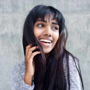 Young Indian girl wearing synthetic hair extensions