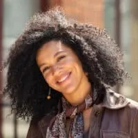 Light-skinned lady with natural curls