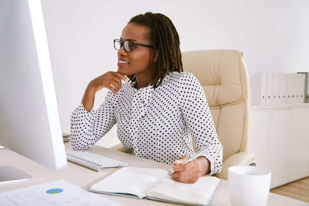 African American lady with brushable hair in the front and dreads in the back