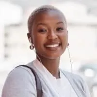 Cute African American female with a light-brown skin tone and a TWA hair length that requires minimal styling.