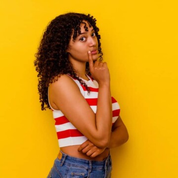 A young mixed-race female with curly natural hair used a wave nouveau kit to encourage hair growth.