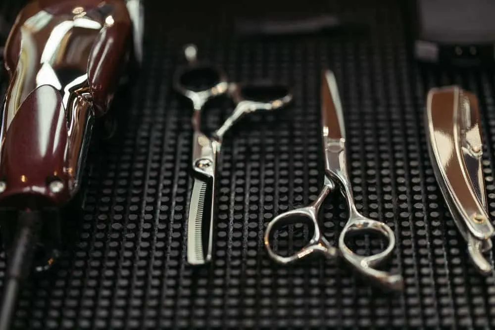 A comb blade, new pair of haircutting shears, a straight razor with a sharp edge, and my own clipper blades.