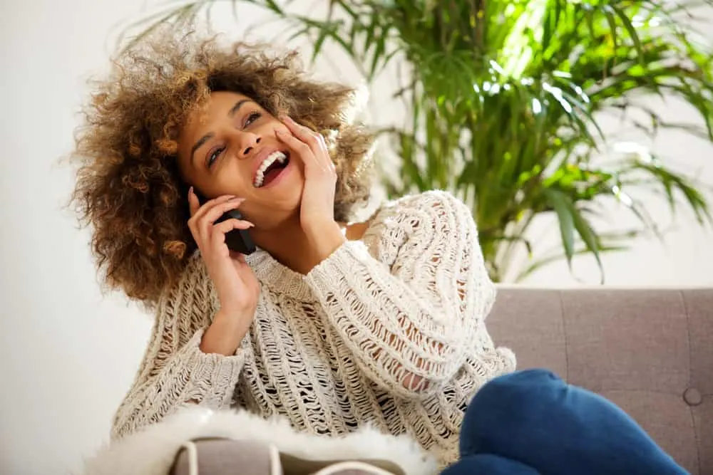 A cute African American female that often wears a wash-and-go because of its tremendous versatility.