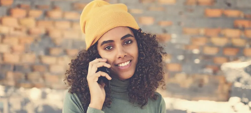 An African American female completed a DIY trim after experiencing excessive breakage.