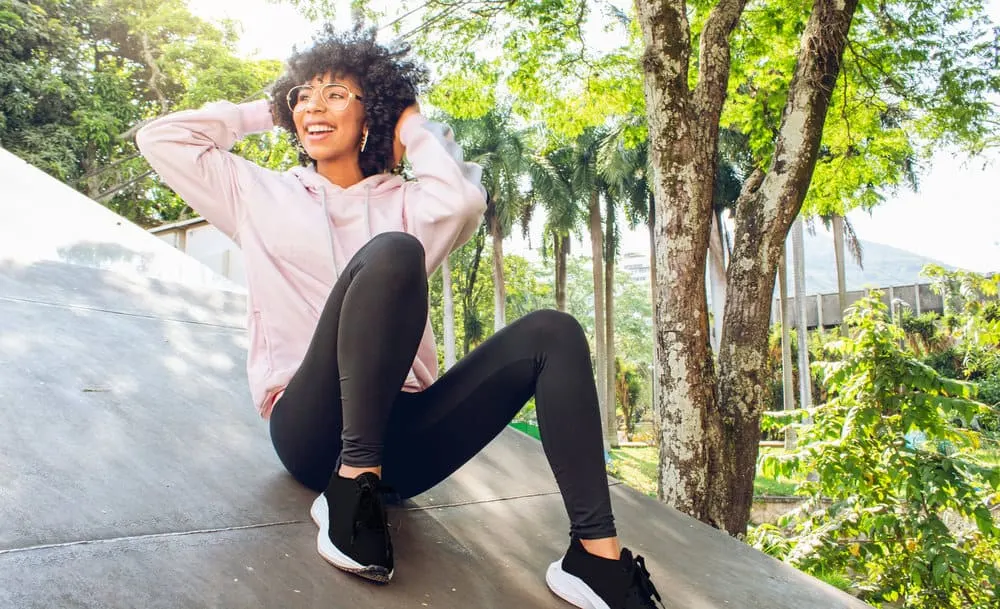 From short curly hairstyles to long and luscious locks, this black girl proves that curly hair can be versatile and beautiful.